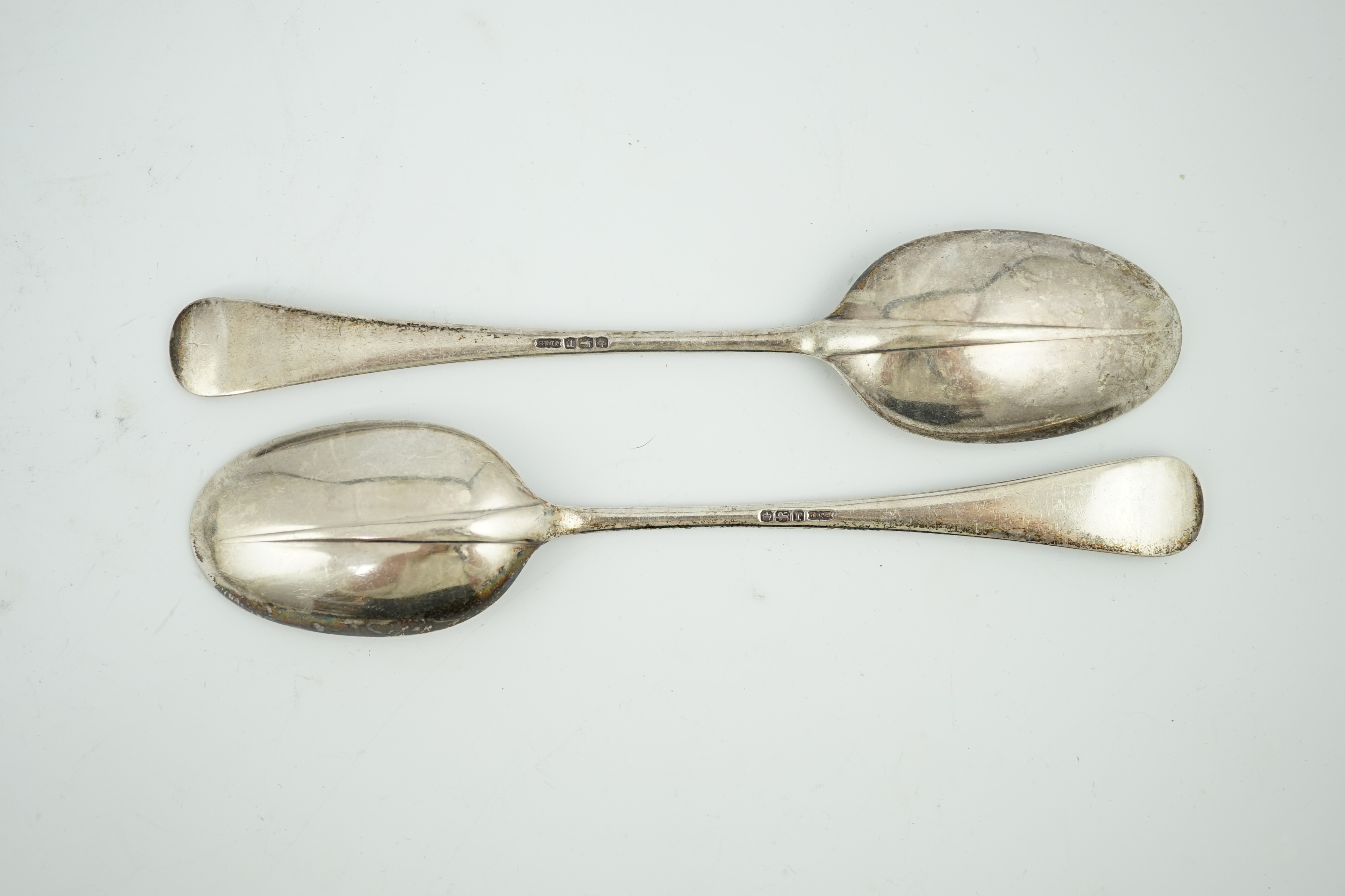 A set of twelve George V silver Hanovarian rat-tail table spoons, by James Dixon & Sons